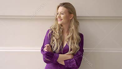 Thoughtful young female in casual clothes looking away