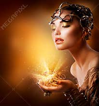 Fashion Girl Portrait. Gold Makeup