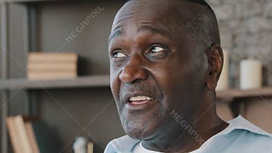 Elderly african american adult 50s man portrait senior grandpa businessman leader saying story talking information to
