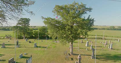 5-30-22 Nebraska USA, American country cemetary out on the plains with some graves decorated for Memorial Day