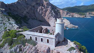 Historical old Ruin on limestone cliff. Great aerial view flight ibiza spain