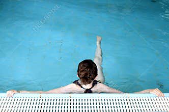 Swimmer relaxing in pool