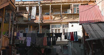 Tbilisi, Georgia. - October 24, 2022: View Of One Of City Courtyards. Drying Clothes In One Of Communal Apartments. Old
