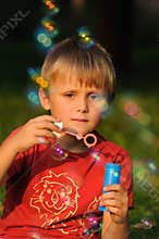 Young boy with bubble gum