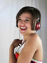 Happy Young girl with headphones