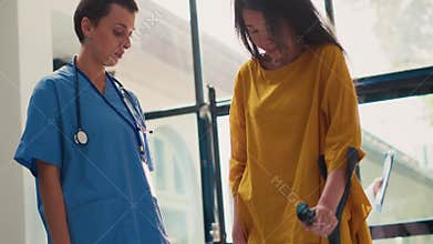 Senior patient trying to walk with walking cane in waiting room