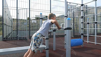 Children on the playground on the street in the yard. Live a healthy life. Be H3althy