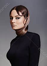 Fashion Model with Flawless Hairstyle and Tendy Make-up