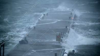 Ship dock rocking violently hurricane force wind and rain Iceland