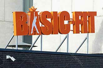 Basic-Fit logo floating on a letter construction. Basic Fit is the largest fitness chain in Europe.