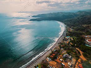 Aerial view of homes by bay