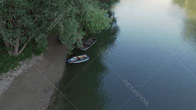 erial drone footage capturing a serene riverside scene along the Rhine River.