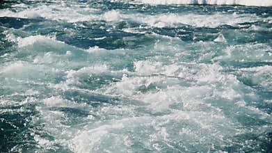 Dynamic and Turbulent Water Waves Moving and Flowing in a River or Ocean, Creating a Beautiful Scene