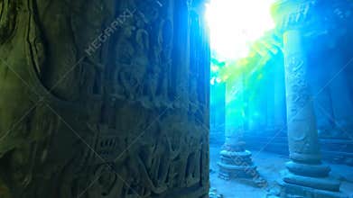 A column with strange glowing ancient writings in the middle of an abandoned temple in mossy forest.