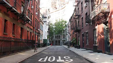 New York City building architecture. Urban residential house exterior. Real estate. Red brick facade