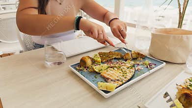 Gourmet Dish Of Swordfish At The Restaurant On The Beach