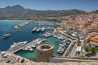 View of citadel with houses in Calvi bay, Corsica island, France