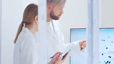 Scientific laboratory filled with various research equipment. Scientists are conducting experiments and research. Science and