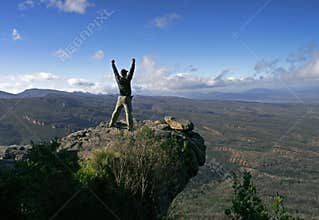 Happy man on peak