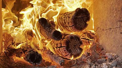 The burning of wood fire, its therapeutic properties, its peaceful texture