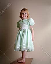 Happy young girl in dress
