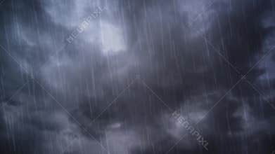 Heavy rain falling from dramatic Sky
