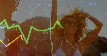 man reaching out toward woman on beach, graph lines sliding across bodies showing finance trend