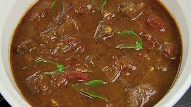 Spooning Indian Curry