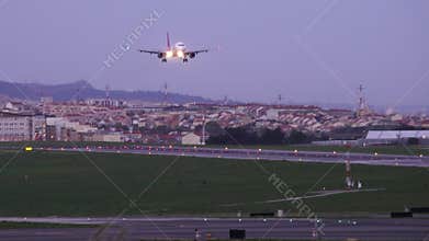 Airplane Airbus A321 is landing in airport