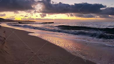 scenic morning at the seashore with flowing waves