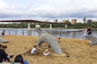 Stone fish installation by the Vistula River near General Patton Boulevard Bulwary and Wisla