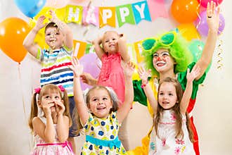 Kids group and clown on birthday party