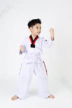 Taekwondo action by a asian cute boy