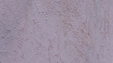 Home restoration project benefits from new coat of pink paint on textured wall