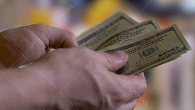 Rich person counts cash money