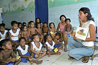 Expressive teacher who reads for toddlers