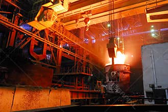 Steel works, crane with stove busket