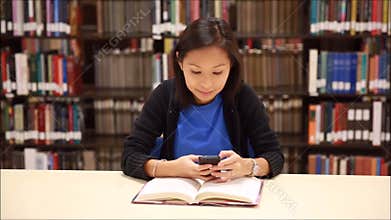 Young beautiful woman texting
