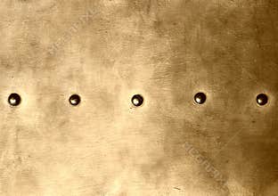 Grunge gold brown metal plate rivets screws background texture