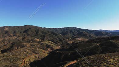 Drone Flyover of Remote Desert Road Through Southern California Mountains