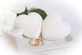 Two Gold Wedding Bands and Hearts