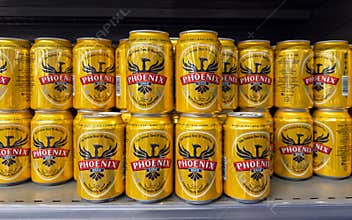 Grand Bay, Mauritius - January 29, 2025: Close-up view of Phoenix Beer cans, labeled The Famous Beer Of Mauritius