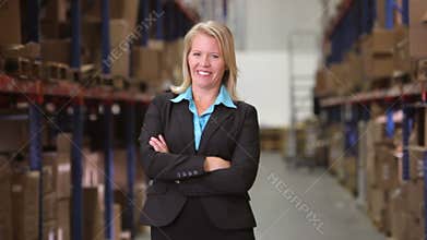 Portrait Of Female Manager In Warehouse