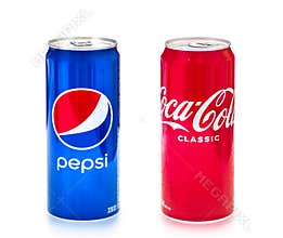 2024: Pepsi and Coca cola in 330ml tin standing on white