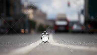Time lapse of Vintage alarm clock on busy street