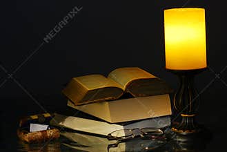 Old Lamp and Books