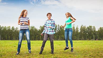 Teens Dancing in a Meadow
