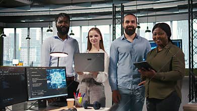 Portrait of smiling teamworking programmers utilizing AI to optimize performance