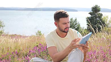 Author writing around inspiring nature