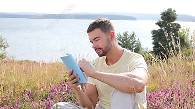 Author writing around inspiring nature